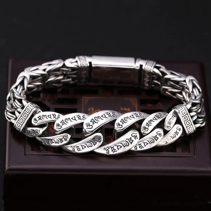 Om Mani Padme Hum engraved copper bracelet top view showing sacred mantra engravings on woven chain link design