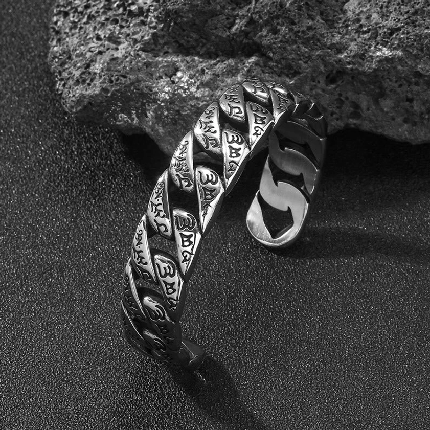 Buddhist mantra titanium steel open cuff bracelet side view showing twisted chain and vintage silver tone finish