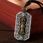 Om Mani Padme Hum carved dorje vajra rotatable lotus pendant necklace dual-tone copper with intricate scroll patterns