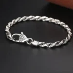 925 sterling silver Om Mani Padme Hum double dorje vajra twisted rope bracelet top view with engraved clasp details