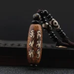 Om Mani Padme Hum Dzi bead Buddhist necklace with hand-painted Sanskrit mantras and Avalokitesvara pattern on natural agate stone
