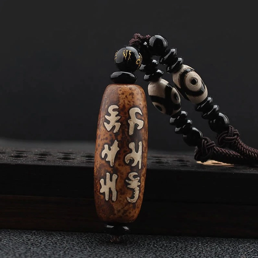 Om Mani Padme Hum Dzi bead Buddhist necklace with hand-painted Sanskrit mantras and Avalokitesvara pattern on natural agate stone