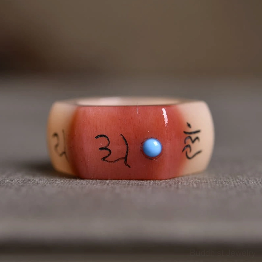 Flat-faced camel bone mantra ring - front view showing Two-tone finish and central blue gemstone inlay
