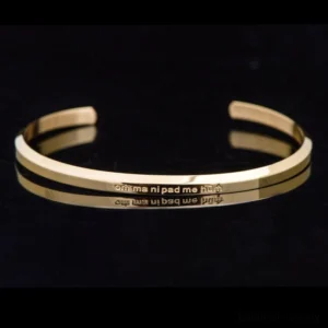 Om Mani Padme Hum engraved gold titanium steel mantra bracelet front view