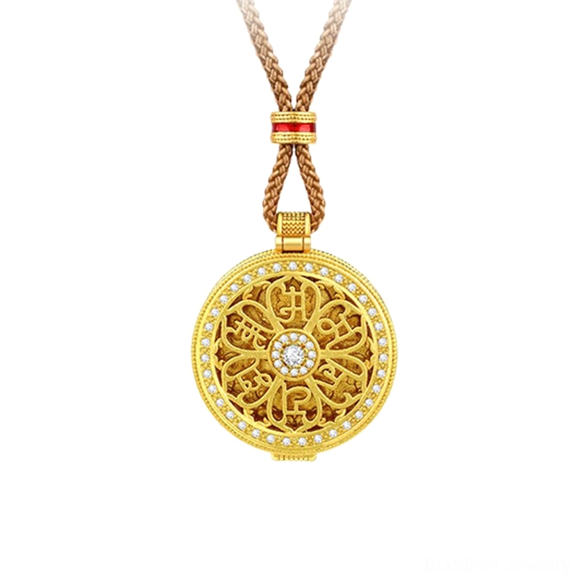 Round hollowed gold Buddhist pendant close-up showcasing intricate floral mantra design with pavé zircon stones and central gemstone