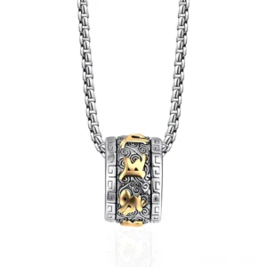 Om Mani Padme Hum titanium steel necklace pendant in golden finish, front view on white background showing carved Sanskrit mantra