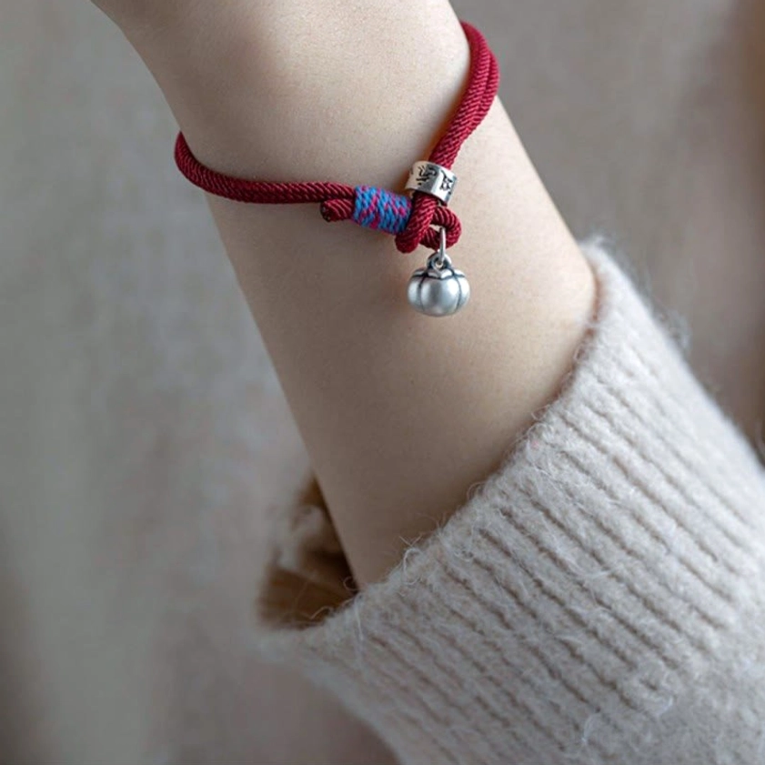 Artisan-crafted Om Mani Padme Hum bracelet showing authentic handmade details and silver embellishments