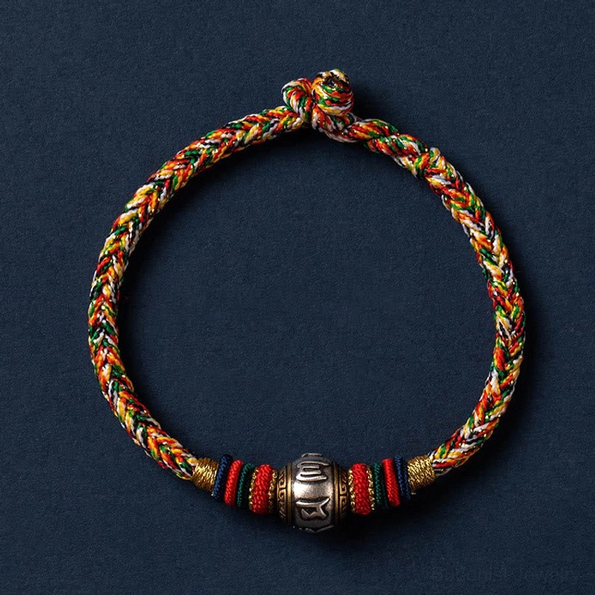 Om Mani Padme Hum bracelet showcasing handmade braided construction with mixed-color accents and 925 sterling silver components