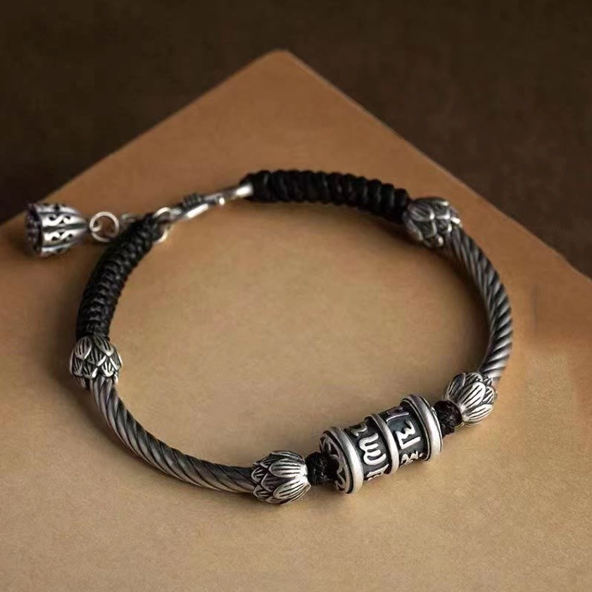 Om Mani Padme Hum lotus braided bracelet with mantra beads and copper twisted wire on kraft paper, featuring adjustable premium buckle