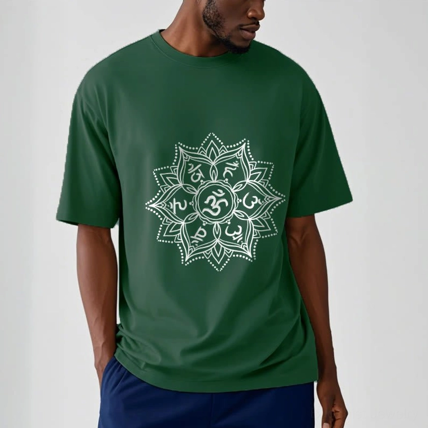 Man wearing deep green Om Mani Padme Hum Mandala Buddhist T-Shirt with dark pants, front view