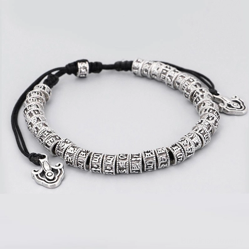 Sacred Om Mani Padme Hum bracelet with polished alloy beads and cloud spacers, three-quarter display view