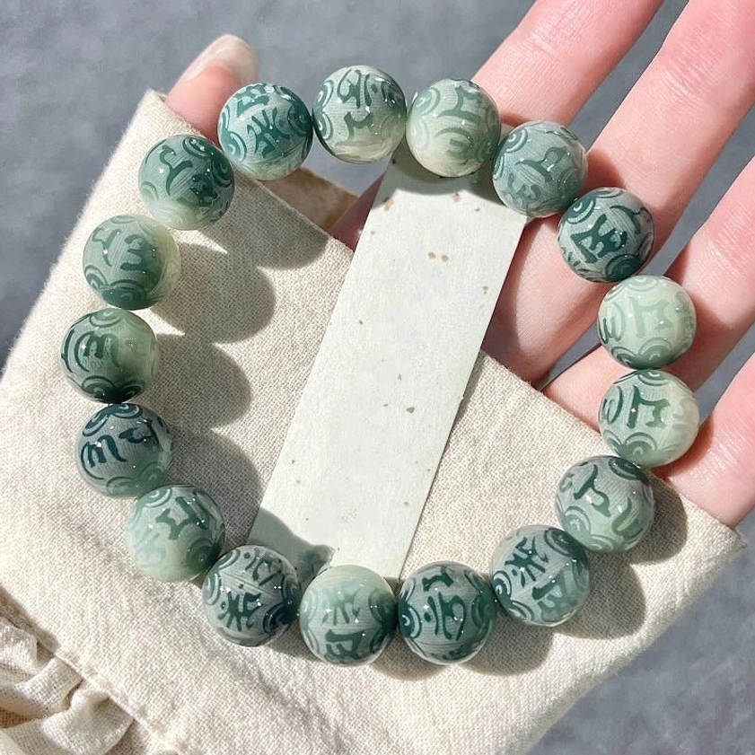 Om Mani Padme Hum universal Buddhist mantra bracelet with engraved sacred syllables on bodhi seeds