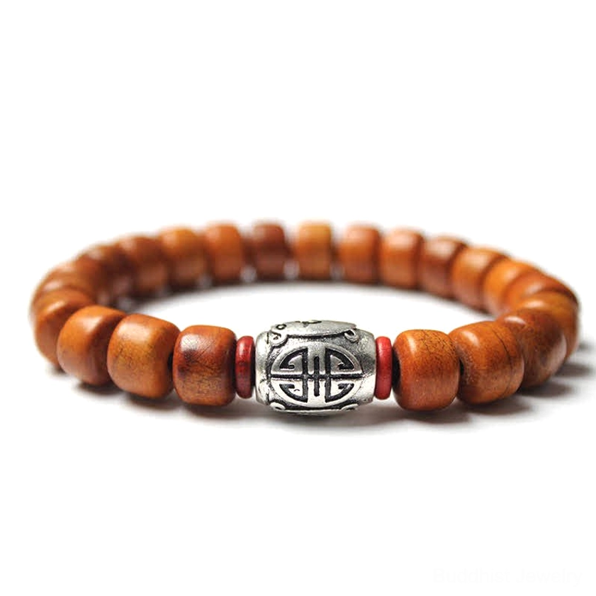 Om Mani Padme Hum meditation bracelet with barrel beads, silver engraved charm and red accent stones