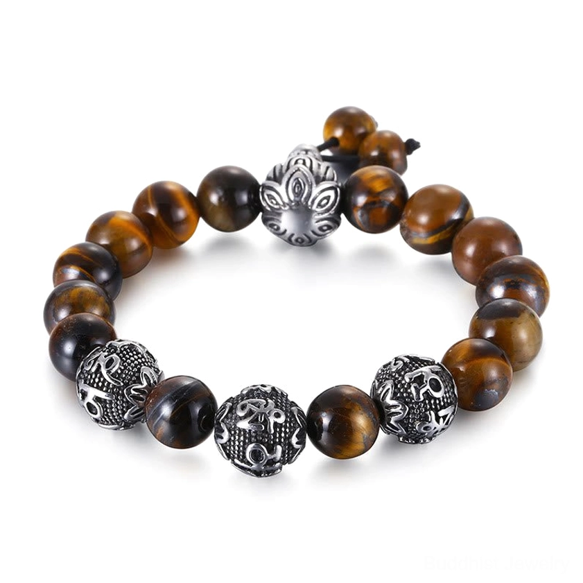 Mixed gemstone Buddhist mantra bracelet with tiger eye, black obsidian, and lava rock beads on plain dark background