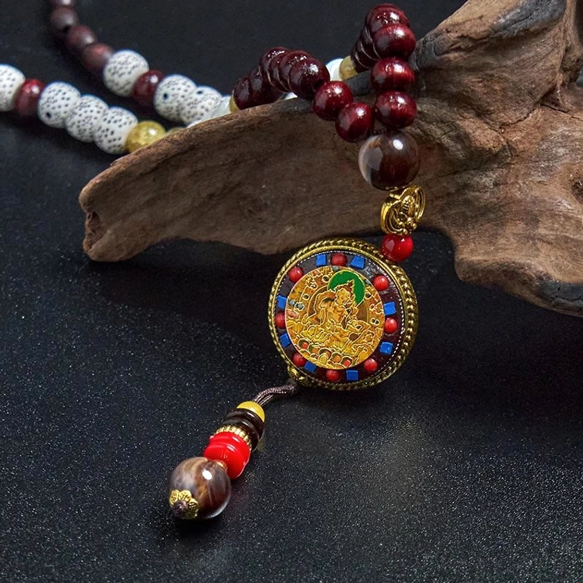 Copper accent details on Buddhist prayer bead necklace, handcrafted mala with metallic elements