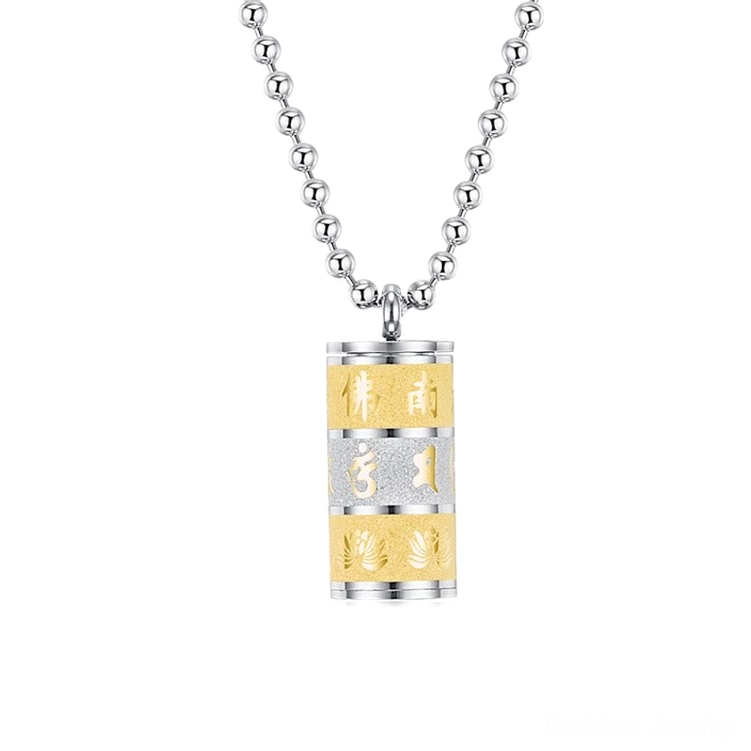Golden and silvery titanium steel prayer wheel pendant necklace with hand-engraved Om Mani Padme Hum mantra and lotus motifs, front hanging view against black background