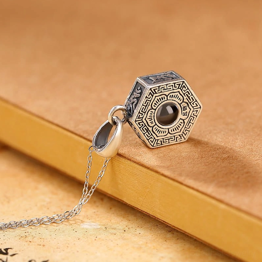 990 Sterling Silver Om Mani Padme Hum Buddhist Necklace - Side Profile Showing Sanskrit Characters and Silver Chain Bail