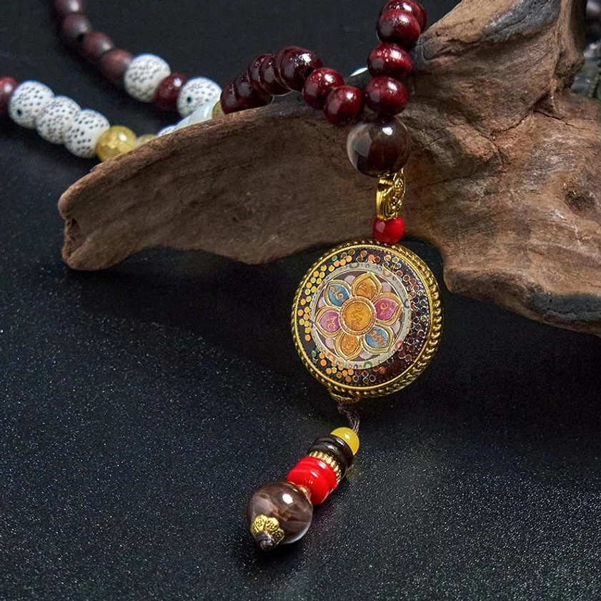 Handmade Buddhist mala necklace worn styling guide, wood beads with copper deity pendant