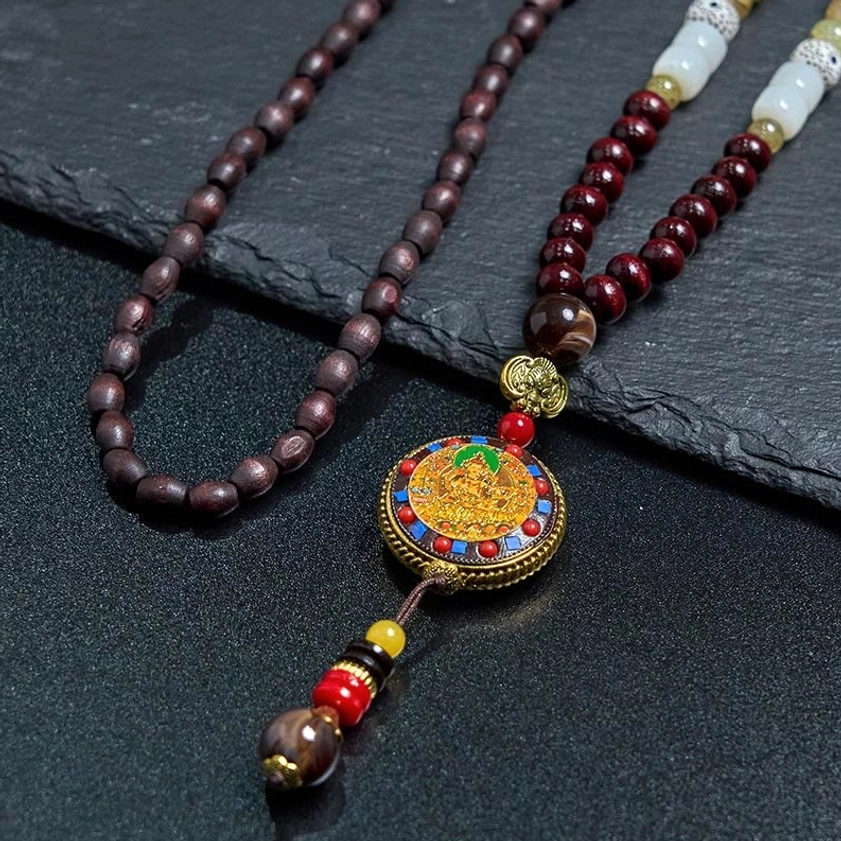 Handcrafted wood bead mala necklace with decorative bead tassel, spiritual Buddhist pendant
