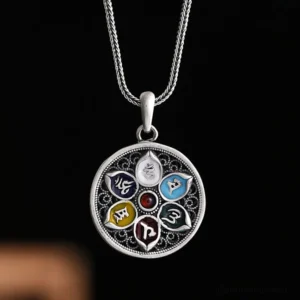 Om Mani Padme Hum silver pendant necklace with multicolored enamel inlay and intricate filigree design - front view