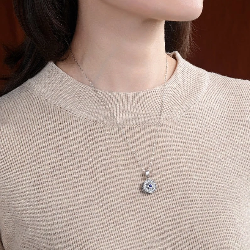 Om Mani Padme Hum sterling silver lapis pendant worn on female neck, minimalist style with thin silver chain, everyday Buddhist jewelry