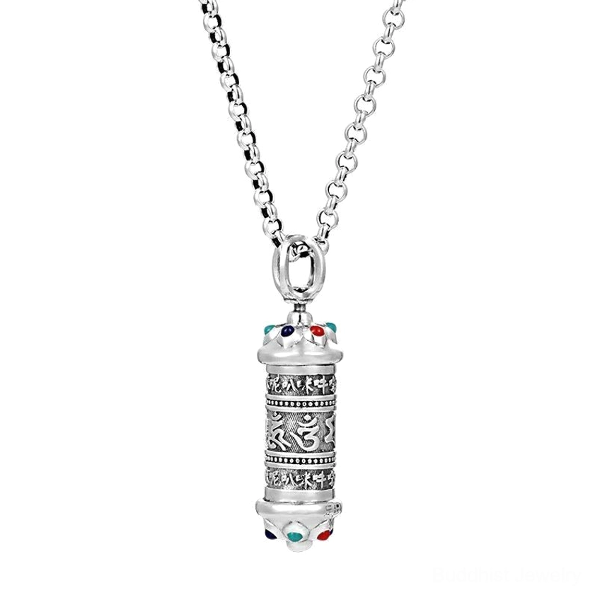 Om Mani Padme Hum silver Buddhist pendant with engraved mantra, vintage silver tone and gemstone details on white background
