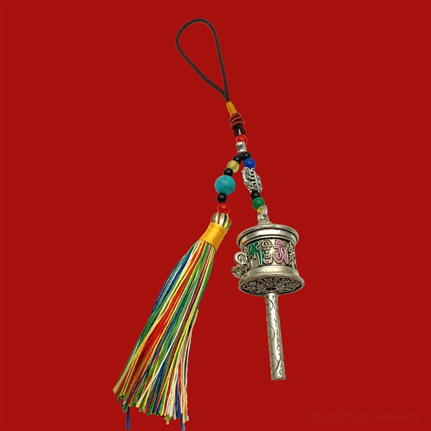 Antique silver Om Mani Padme Hum prayer wheel keychain with patina finish and multicolored tassel decoration