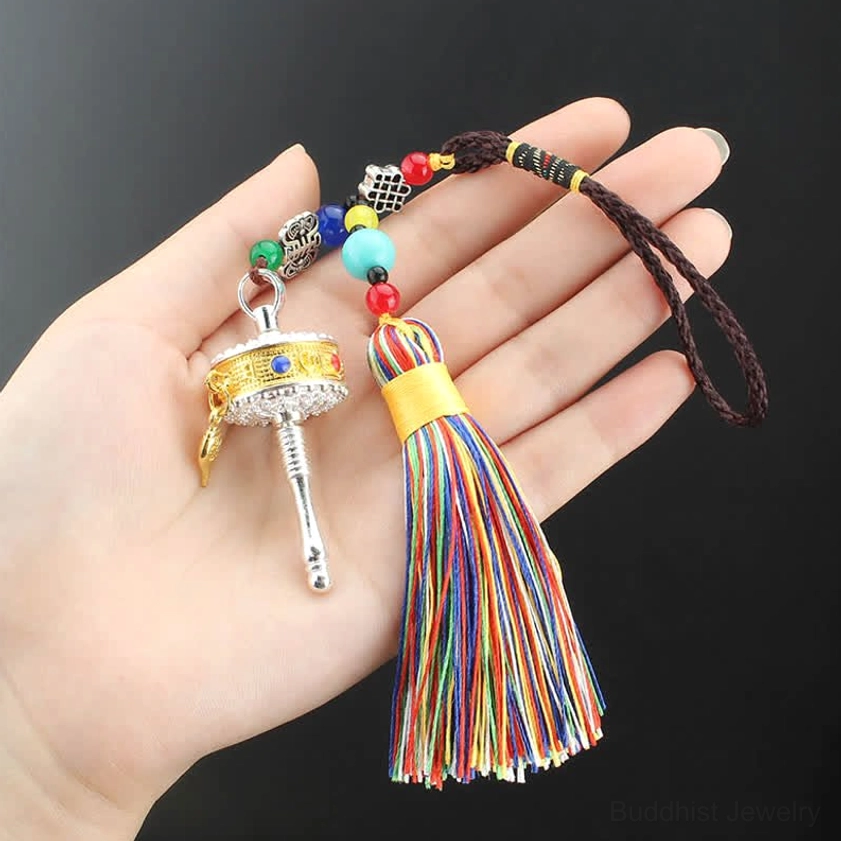 Buddhist Om Mani Padme Hum prayer wheel tassel decoration for meditation and mindfulness