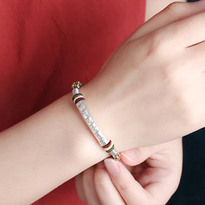 Sterling silver om mani padme hum red string Buddhist bracelet handmade with sacred mantra engraving and adjustable sizing