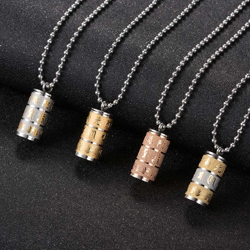 Titanium steel Om Mani Padme Hum prayer wheel pendant necklace showing removable pendant design with engraved sacred Buddhist mantra and lotus flower symbolism