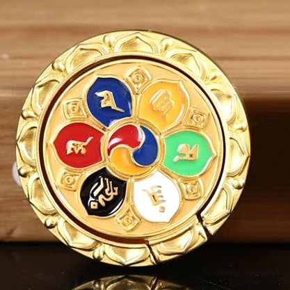 Single Om Mani Padme Hum phone ring holder close-up with gold-tone metal and colored enamel details on lotus border, front view