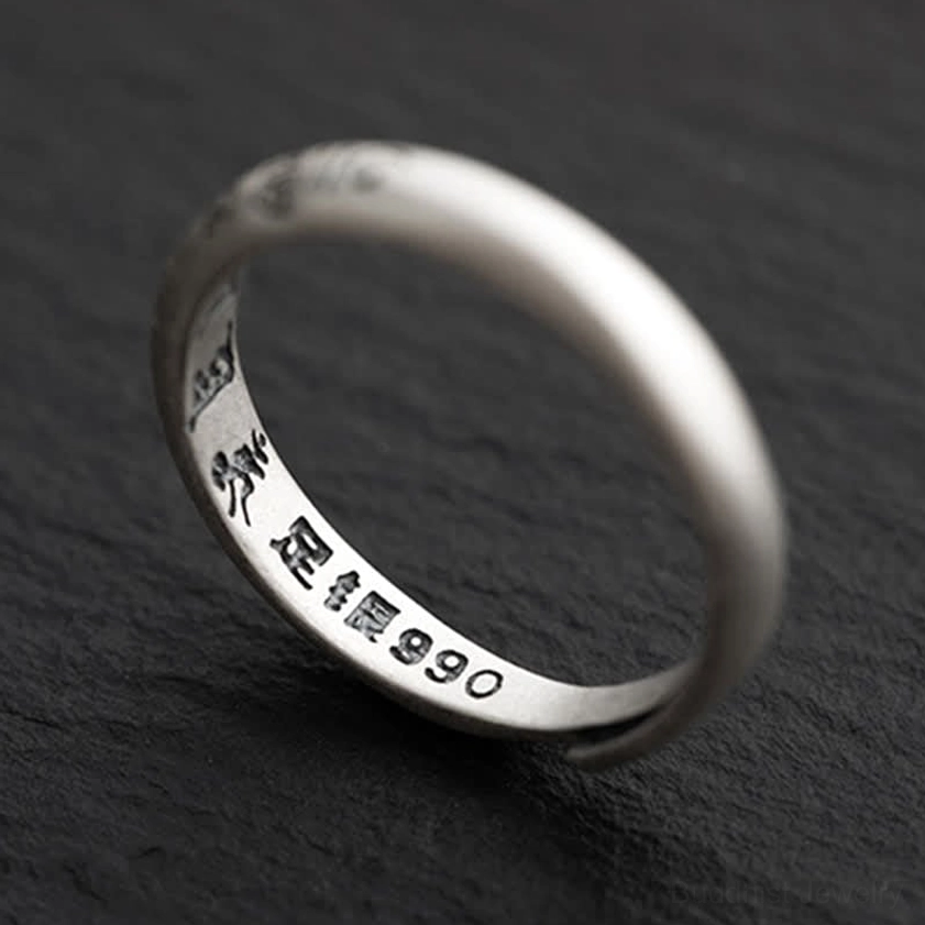 Om Mani Padme Hum sterling silver Buddhist mantra ring craftsmanship patina development
