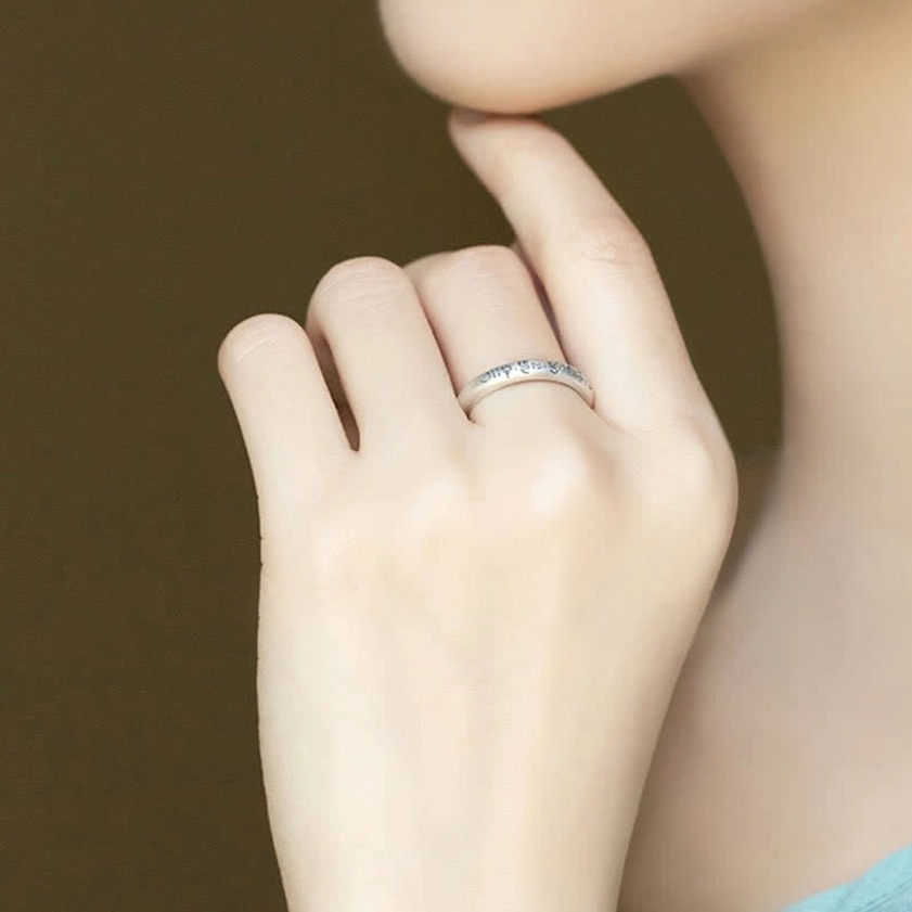 Om Mani Padme Hum sterling silver Buddhist ring worn on hand showing real-life wearing style comfort