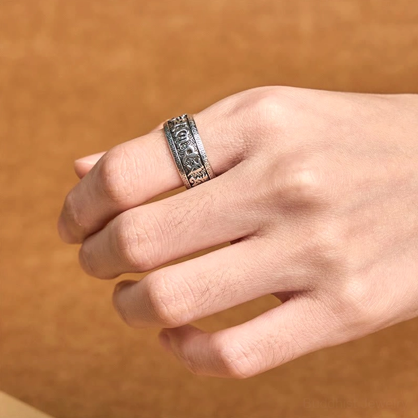 Vintage copper Buddhist mantra ring worn on hand showing comfort fit and spiritual design