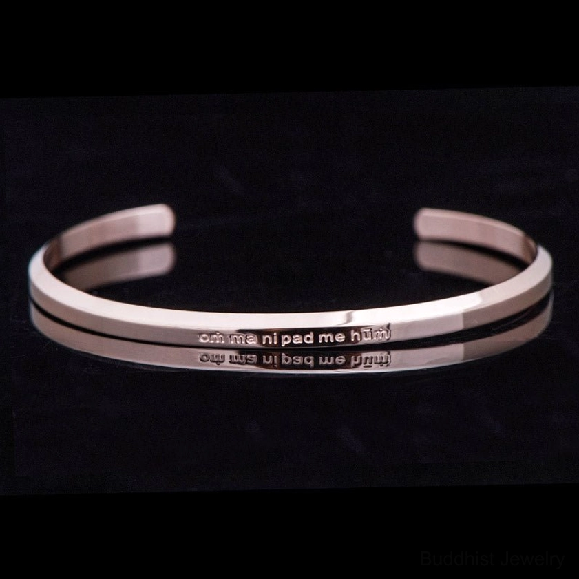 Rose gold engraved mantra bracelet with polished finish