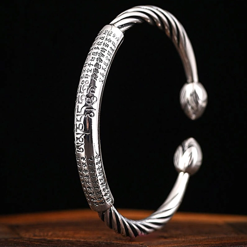 Om Mani Padme Hum copper cuff bracelet highlighting the sacred six true words mantra in hand-engraved detail, perfect for Buddhist meditation and spiritual practice