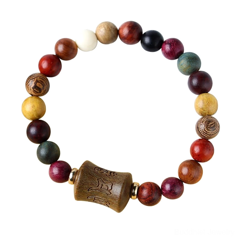 Om Mani Padme Hum sandalwood prayer bracelet featuring natural mixed wood colors and traditional Buddhist mantra carving