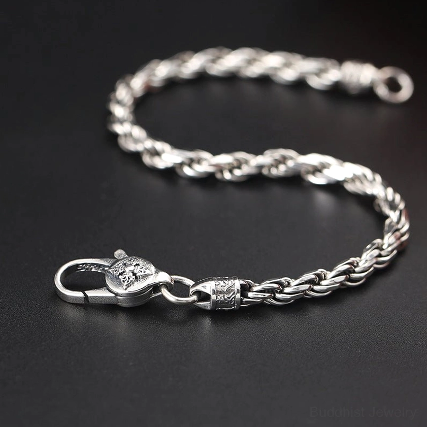 Unfolded om mani padme hum double dorje silver bracelet full length display showing twisted rope chain design