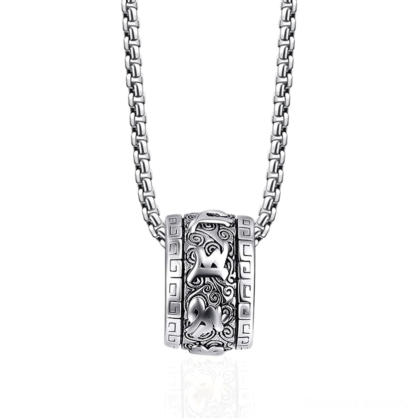 All-silver Om Mani Padme Hum necklace with intricately carved barrel pendant, front view on white background