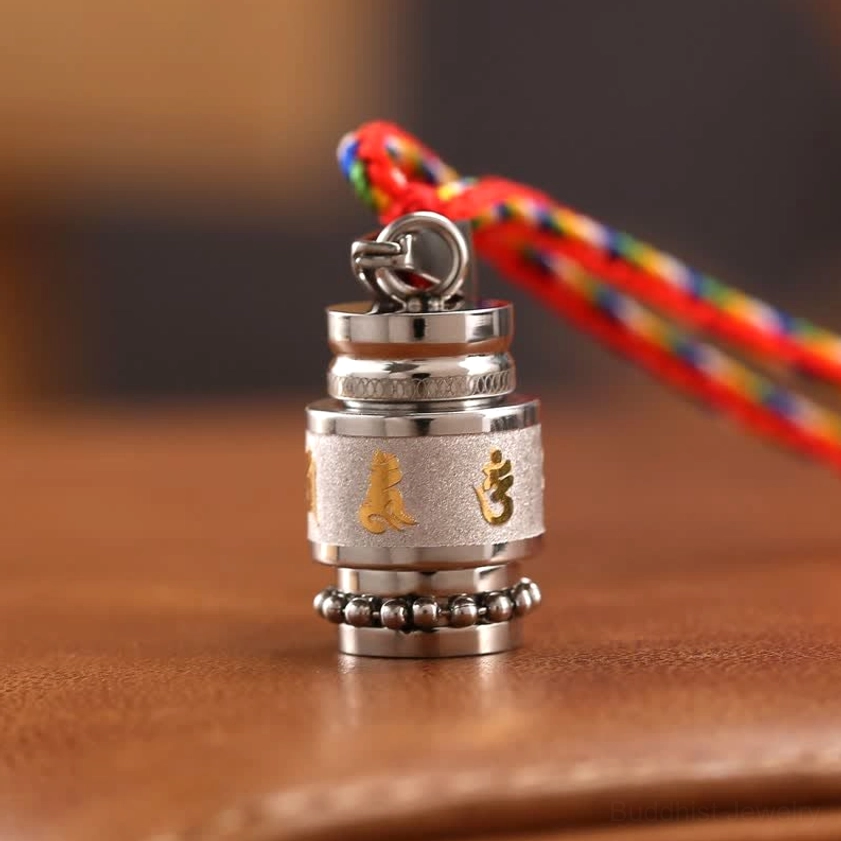 Om Mani Padme Hum titanium steel pendant in silver finish with colorful woven string lanyard detail shot