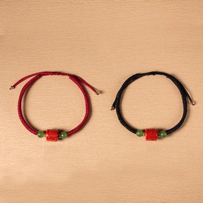 Om Mani Padme Hum six-syllable mantra cinnabar bracelet with adjustable braided rope closure and spiritual beads