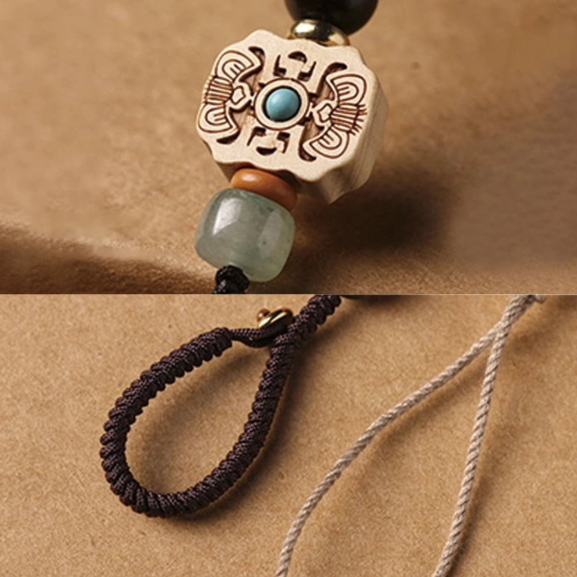 Om Mani Padme Hum Buddhist mantra six syllables sacred meaning carved into sandalwood charm