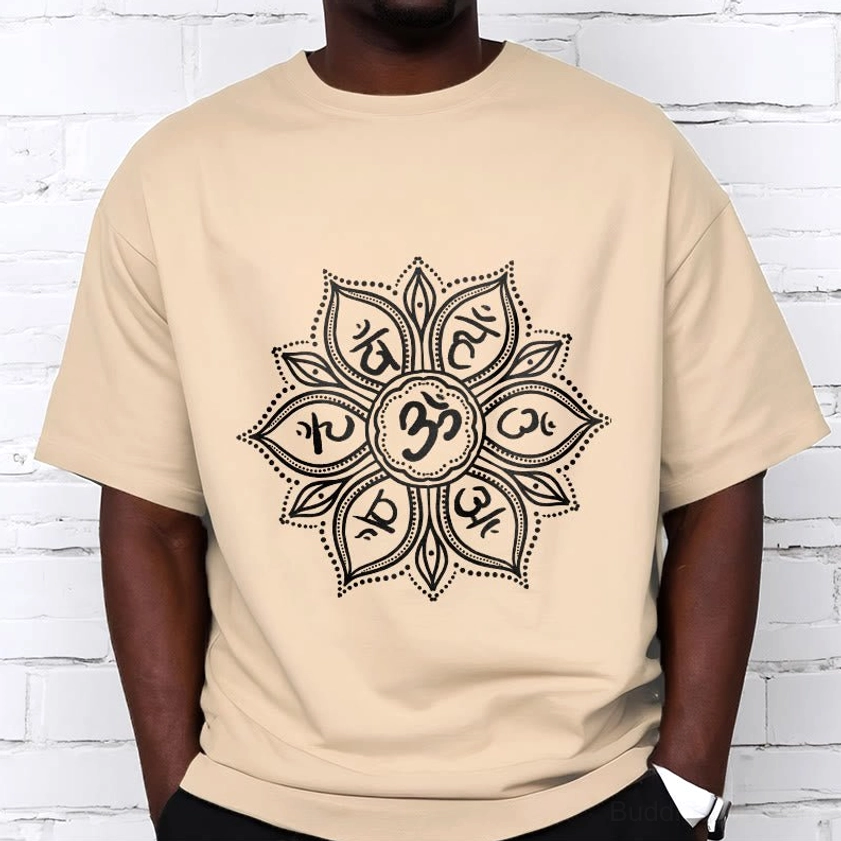 Model wearing light cyan Buddhist mandala t-shirt demonstrating unisex relaxed fit with spiritual mantra design
