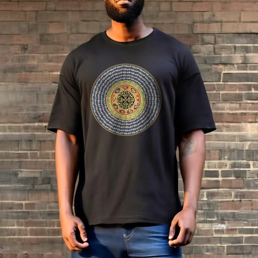 Woman in om mani padme hum buddhist tee charcoal gray with blue jeans brick wall backdrop
