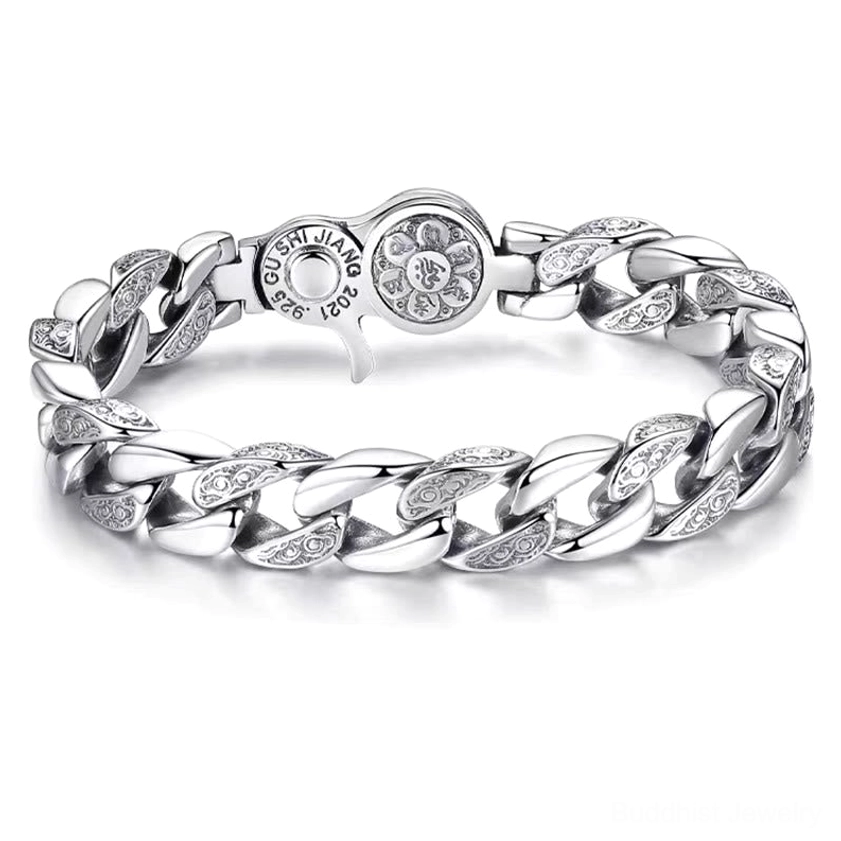 Close-up detail of Om Mani Padme Hum bracelet showing dual vajra emblems and polished silver finish with brand marking