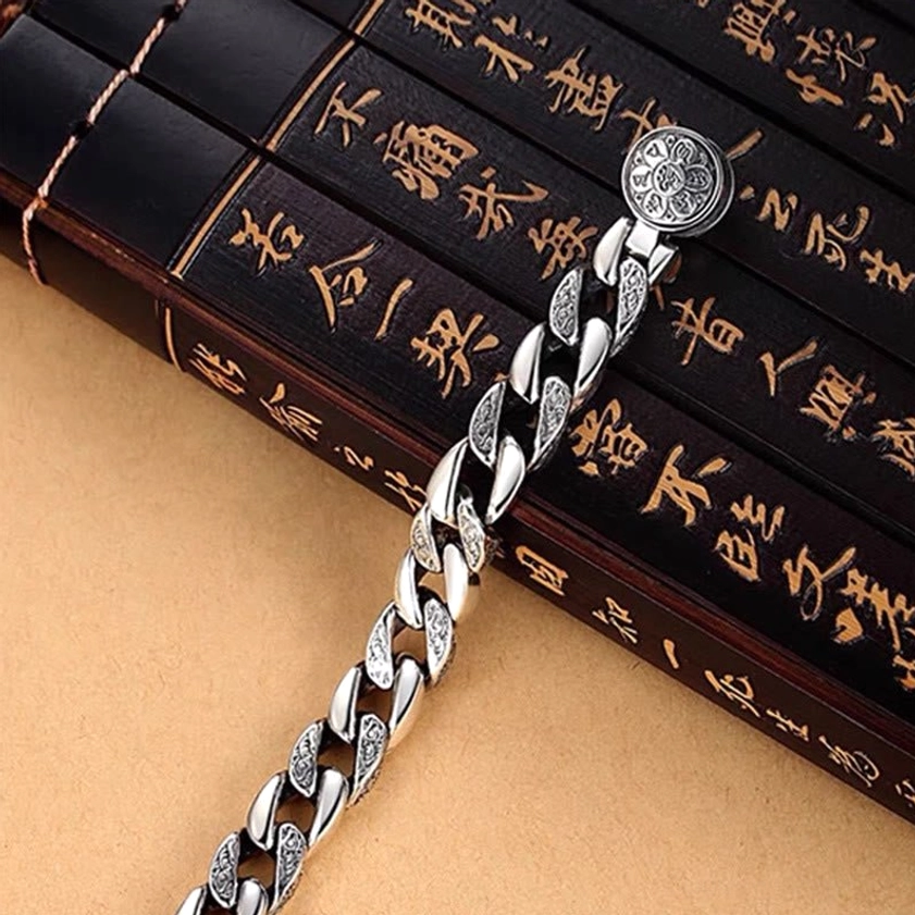 Om Mani Padme Hum Vajra bracelet styled with vintage Buddhist books and calligraphy for spiritual aesthetic