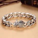 Om Mani Padme Hum Double Dorje Vajra bracelet top view flat lay showing engraved silver curb chain with round vajra emblem