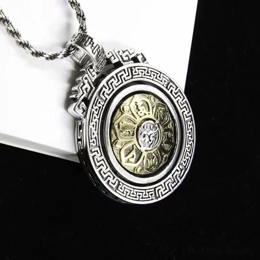 Om Mani Padme Hum rotatable double vajra Buddhist pendant necklace front view with silver frame and gold lotus design