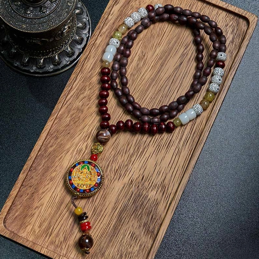 Om Mani Padme Hum wood bead mala necklace with copper pendant, handcrafted Buddhist prayer beads on wooden tray