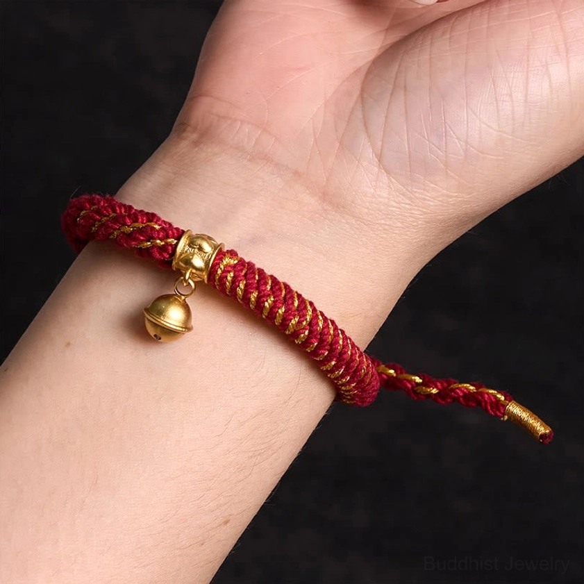 Om Mani Padme Hum Buddhist bracelet with traditional Zakiram amulet and decorative bell attachment